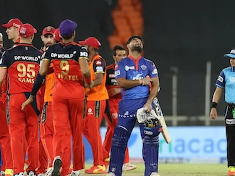 RCB vs DC Match Prediction 2026 with Bengaluru stadium high scoring IPL match scene